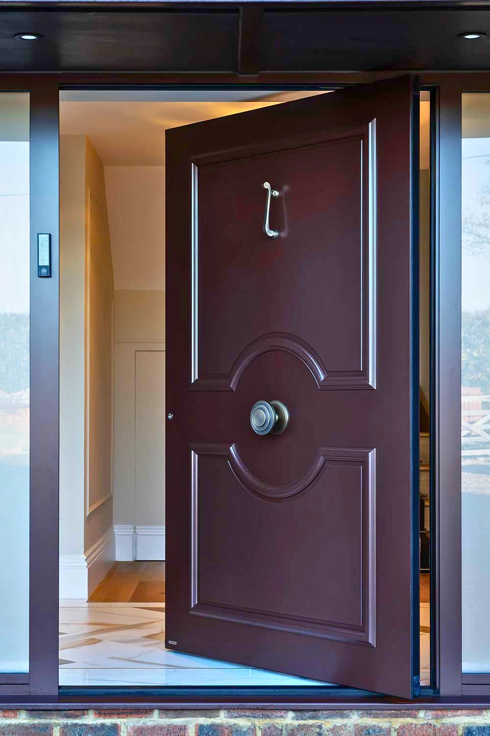 The Hollies entrance door opening into the hallway